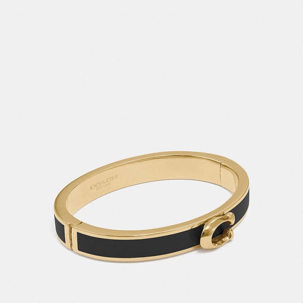 COACH Signature Push Hinged Black and Gold Bangle